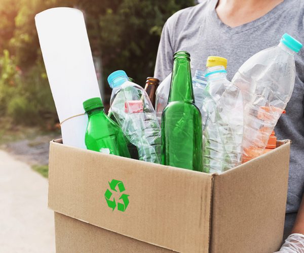 woman hand holdging box garbage for recycle